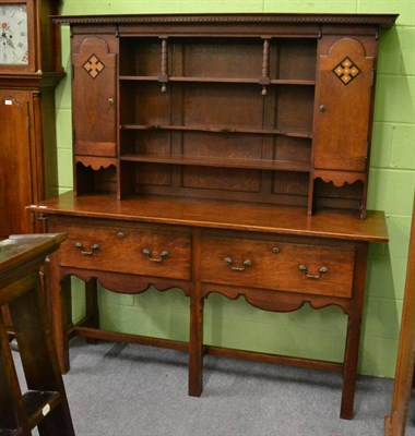 Lot 1121 - Arts & Crafts dresser and rack