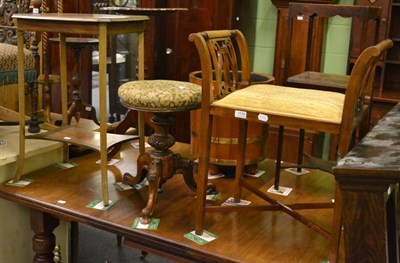 Lot 1130 - An Edwardian mahogany dressing stool, a Victorian walnut revolving dressing stool and an occasional