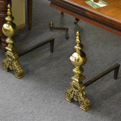 Lot 1131 - A pair of brass andirons