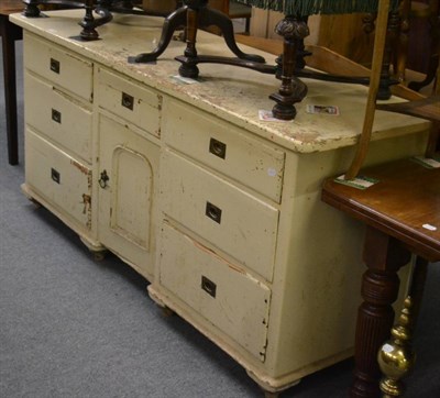 Lot 1134 - A cream painted pine dresser