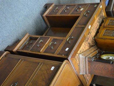 Lot 1139 - A Georgian style yew wood kneehole desk