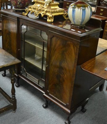 Lot 1148 - A mahogany side cabinet with glazed centre section