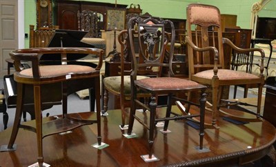 Lot 1150 - An Edwardian mahogany rocking chair, kidney shaped dressing stool and two salon chairs