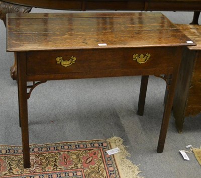 Lot 1153 - An 18th century and later oak side table with a single drawer