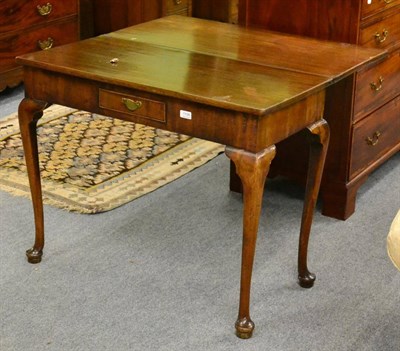 Lot 1156 - 18th century walnut fold-over tea table