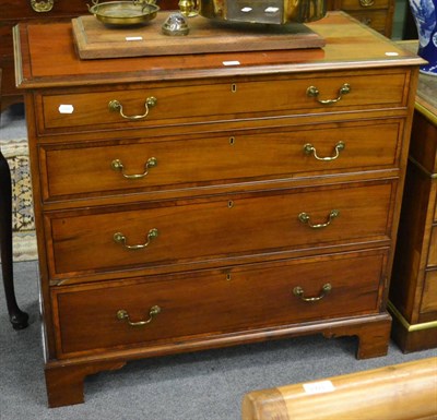 Lot 1157 - A 19th century crossbanded mahogany four height chest