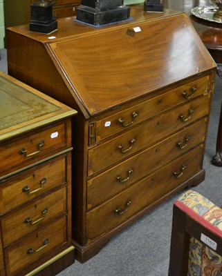 Lot 1159 - Late Georgian mahogany small bureau