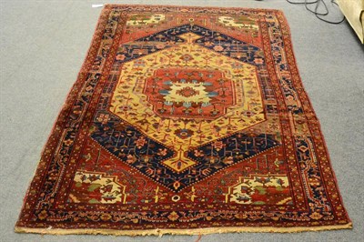 Lot 1182 - Azeri Rug, North West Persia, the indigo lozenge field of angular vines centred by a brick red...