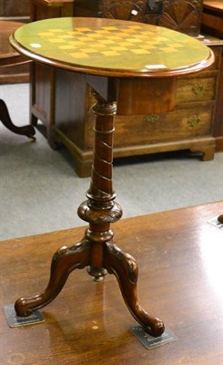 Lot 1186 - A Victorian drop leaf games table