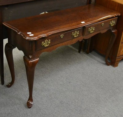 Lot 1198 - Reproduction mahogany two drawer side table