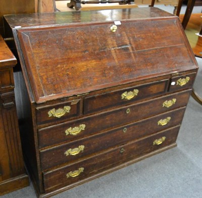 Lot 1205 - An oak bureau