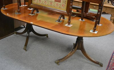 Lot 1208 - A 19th century style mahogany twin-pedestal dining table