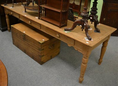 Lot 1218 - A large pine kitchen table with three frieze drawers