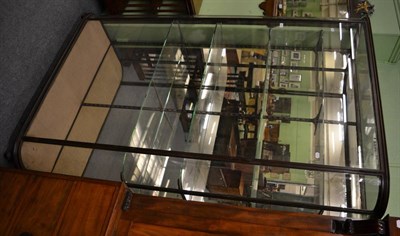 Lot 1235 - A cast iron framed glazed shop display cabinet