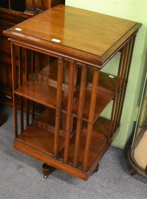 Lot 1237 - An American walnut revolving bookcase by Danners of Ohio