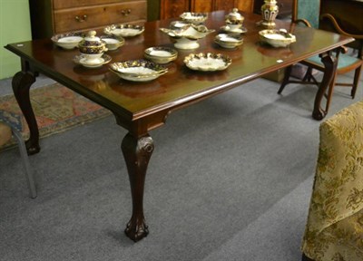 Lot 1242 - A mahogany table on claw and ball feet