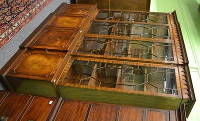 Lot 1247 - A Regency style reproduction breakfront bookcase, with astragal glazed doors