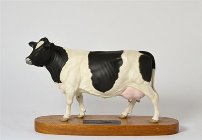 Lot 79 - Beswick Connoisseur Friesian Cow, model No. A2607, satin matt, on wood plinth
