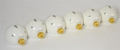 Lot 105 - Royal Doulton Snowman Christmas tree baubles, with colour image on the front and green star...