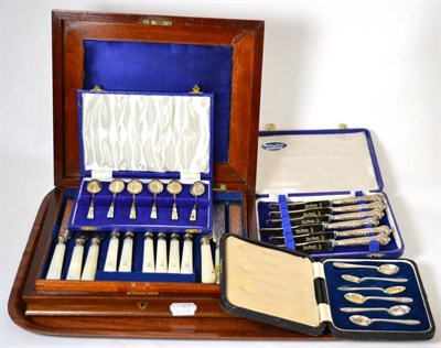 Lot 134 - A mother-of-pearl cased fruit service, cased silver teaspoons, cased enamelled silver teaspoons and