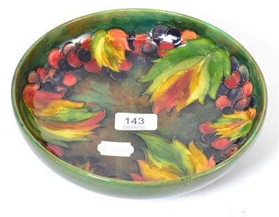 Lot 143 - A Walter Moorcroft flambe leaf and grape pattern bowl