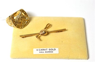 Lot 153 - A 9ct gold horse head ring and an equestrian bar brooch