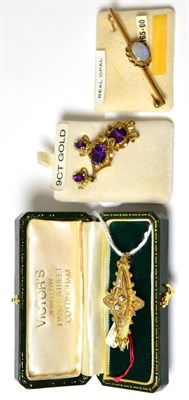 Lot 155 - A pair of amethyst set drop earrings, an opal set bar brooch and another brooch (3)