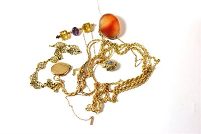 Lot 165 - A group of gold jewellery including a 9ct gold locket, 9ct gold chain with hardstone pendant,...