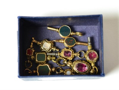 Lot 178 - Nine Victorian hardstone mounted watch keys and a similar pendant fob