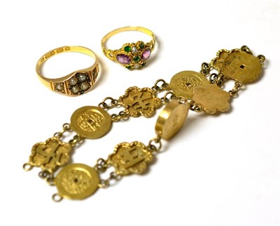 Lot 206 - A Chinese yellow metal bracelet, a small gem set ring and an 18ct gold seed pearl and peridot...
