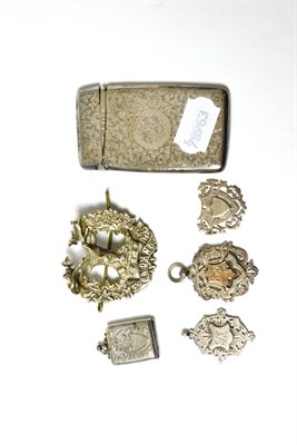Lot 208 - Silver card case, three silver fobs, silver stamp holder and a cap badge