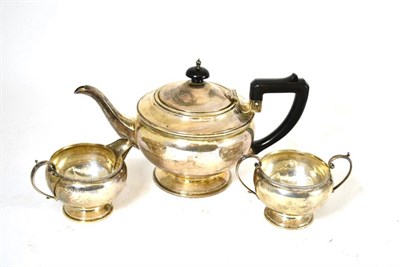 Lot 223 - A silver three piece tea service