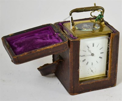 Lot 224 - A brass striking and repeating carriage clock with alarm