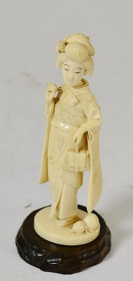 Lot 228 - A late 19th century Japanese carved ivory figure