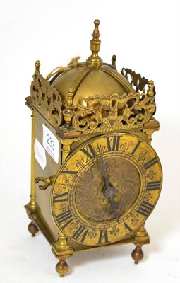 Lot 233 - A small lantern clock