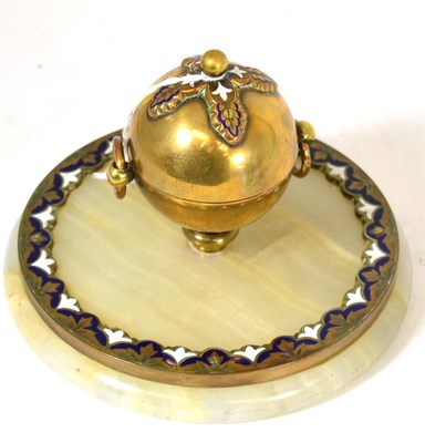 Lot 238 - A blue and white enamel decorated circular brass inkwell, diameter of base 16cm