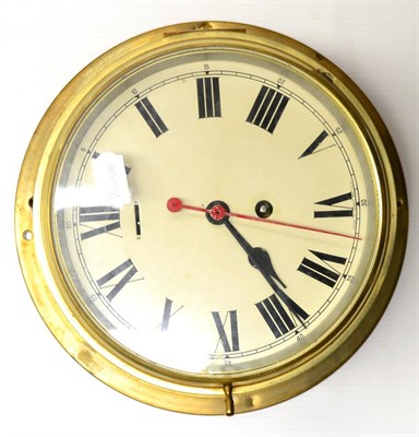 Lot 259 - RAF Guttersloh brass cased wall clock