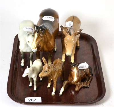 Lot 282 - A group of Beswick pottery horses and donkeys including brown and grey