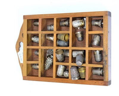 Lot 585 - A collection of thimbles, mostly silver