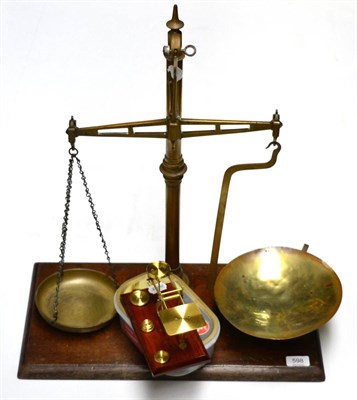 Lot 598 - A set of brass scales and modern postal scales with weights