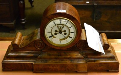Lot 613 - A Victorian walnut cased mantel clock
