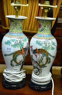 Lot 615 - A pair of modern Chinese famille rose enamel vases mounted as lamps