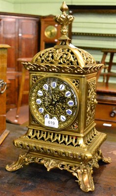 Lot 619 - A pierced and gilt metal mantle clock, retailed by Miller & Son