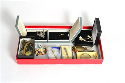 Lot 636 - A Snow White and the Seven Dwarfs celluloid brooch, a gold cross, a gold pin in the form of a...