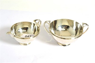 Lot 647 - An Art Nouveau silver cream jug and sugar bowl, Goldsmiths & Silversmiths Co Ltd, London 1905