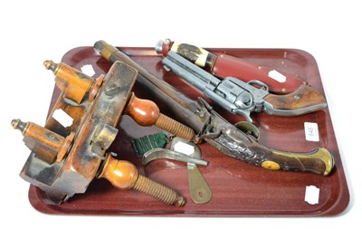 Lot 648 - A late 18th century Spanish flintlock holster pistol, a non-working copy of a Colt revolver, a...