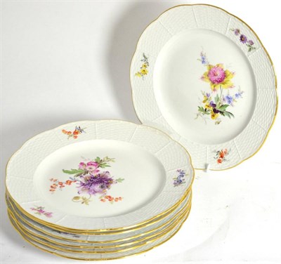 Lot 657 - A set of seven 20th century Meissen dessert plates, decorated with floral sprays
