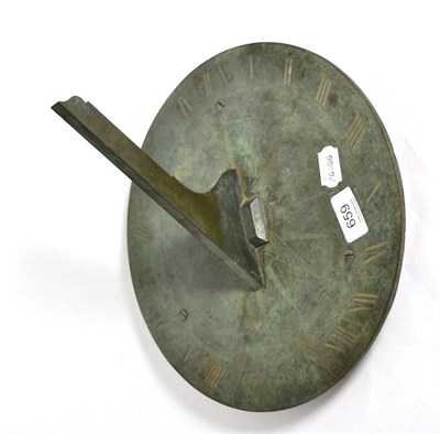 Lot 659 - A bronze sundial 18th century by J. Simons with research documentation