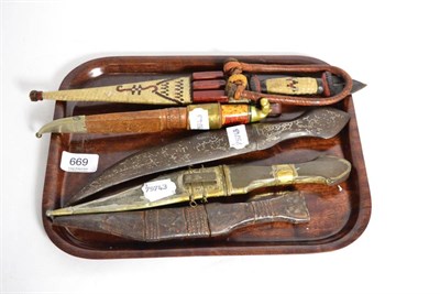 Lot 669 - Persian white metal inlaid steel dagger, NA dagger, Finnish knife and two others