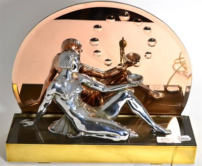 Lot 670 - An Art Deco electric mantel timepiece